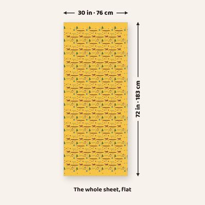 The full Braai Kersfees wrapping paper sheet laid flat, marked 30 in (76 cm) wide and 72 in (183 cm) long