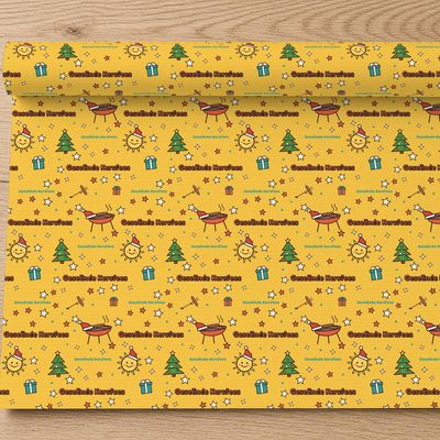Braai Kersfees wrapping paper roll, 30 x 72 in: Roll partly unrolled on light oak (top-down), pattern at true scale for a 30in roll