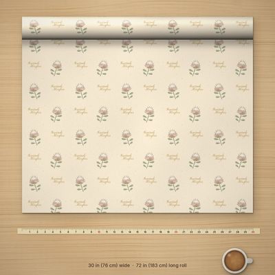 Koningsprotea wrapping paper roll, 30 x 72 in: Top-down: full 30in width with a cloth tape measure (real inch marks) and mug