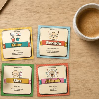 Launch 4-pack (Sunny Mix): Top-down flat lay on oak with kraft paper, coffee, twine and eucalyptus